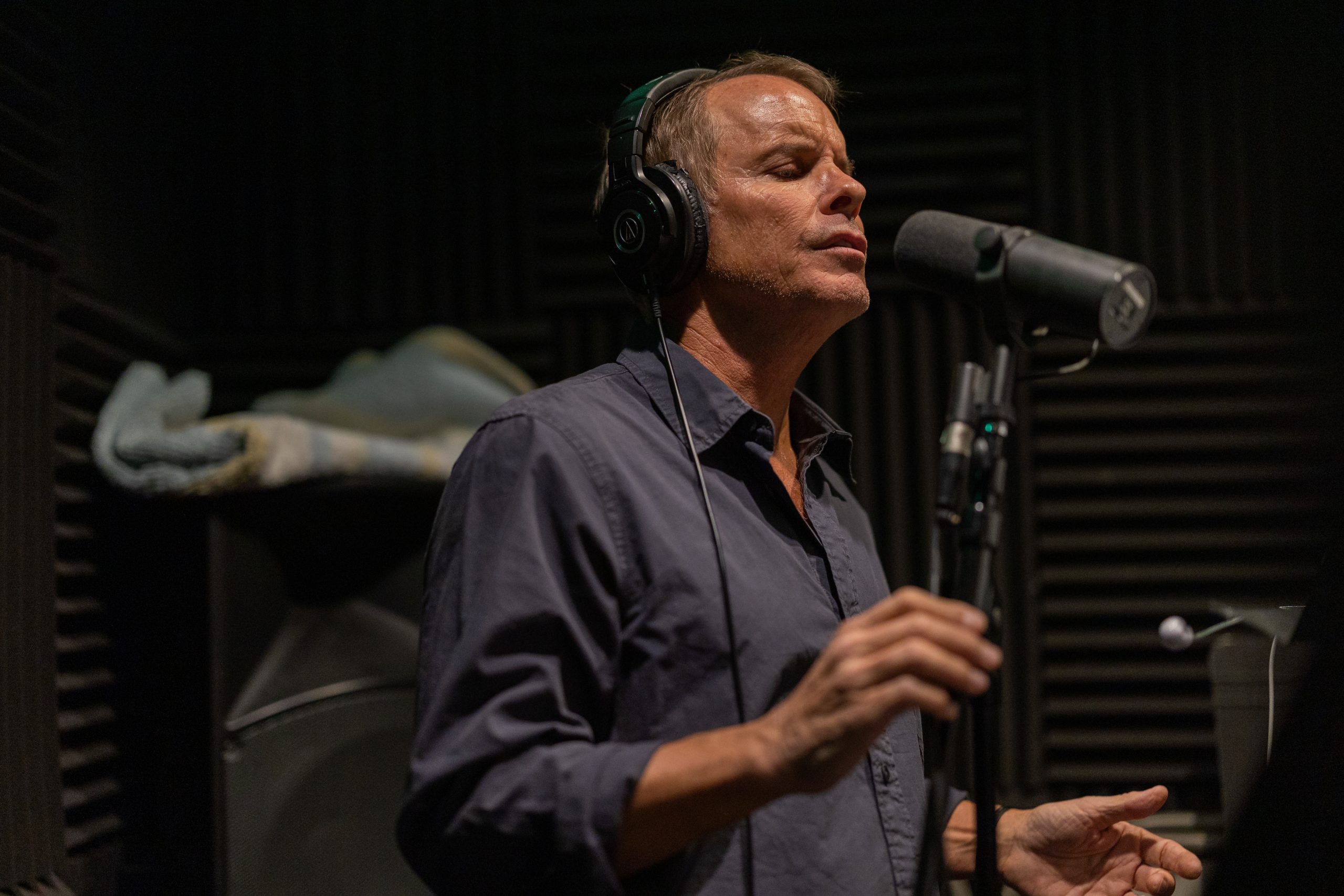 Josh Canova in recording booth