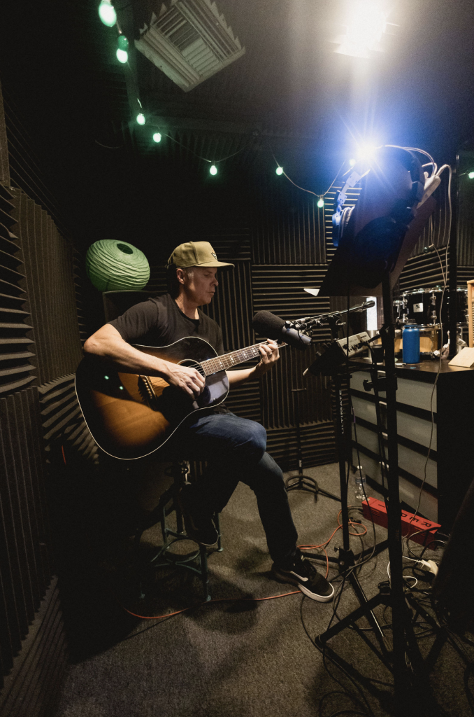 Josh Canova in recording booth